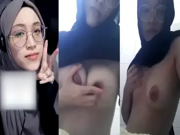 Bokep Jilbab Ukhti Berkacamata Dada Montok Basah poster