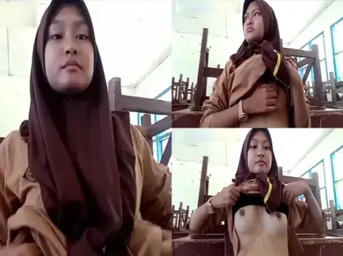 Siswi Hijab Pamer Buah Dada Di Kelas Sepi backdrop